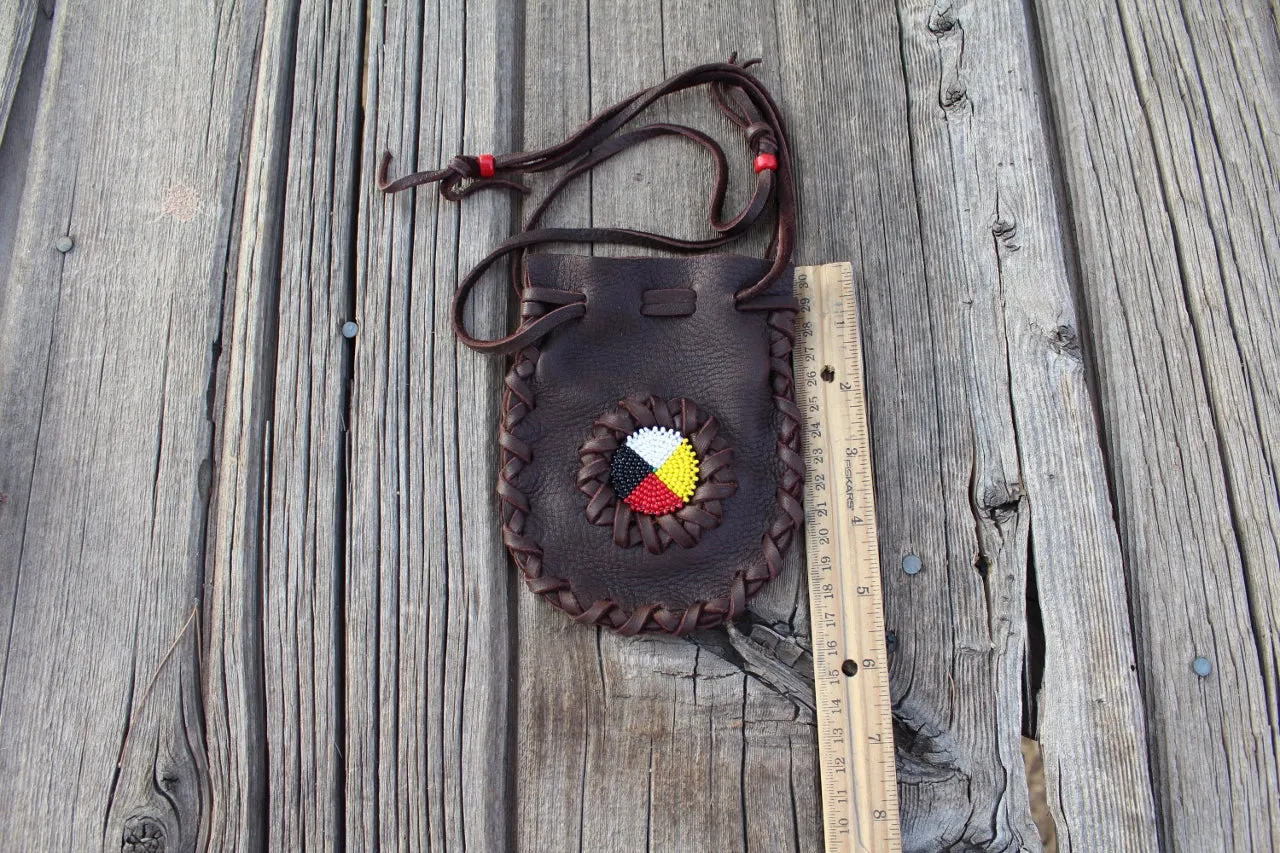 Beaded leather amulet bag with four directions beadwork