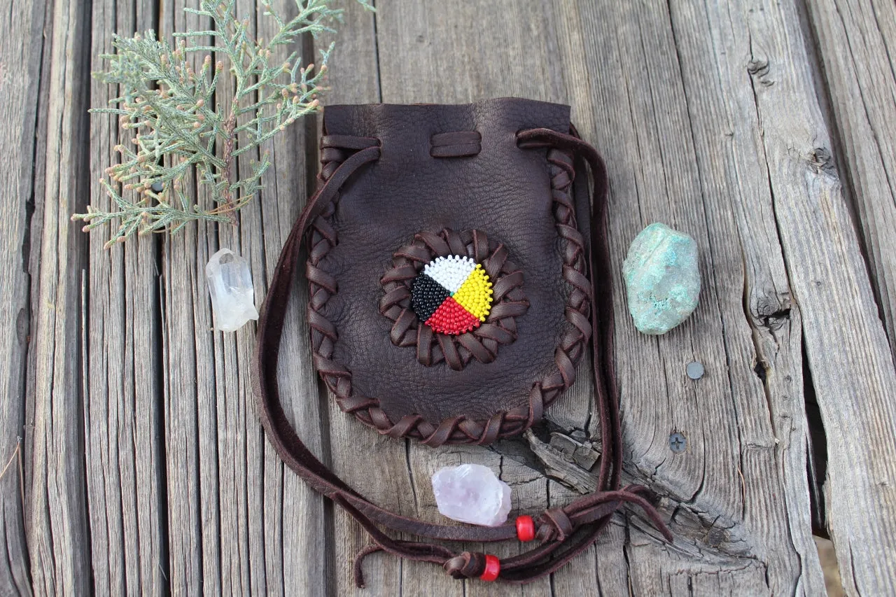 Beaded leather amulet bag with four directions beadwork