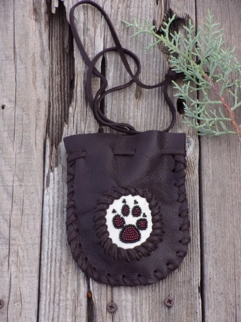 Beaded wolf paw medicine bag , leather amulet bag