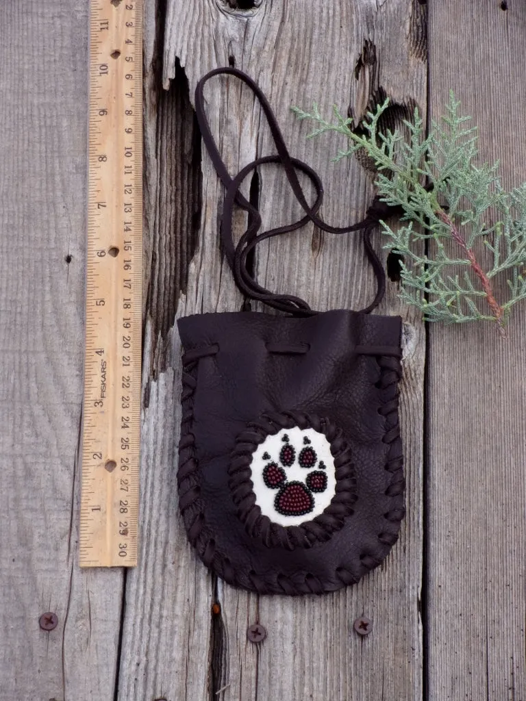 Beaded wolf paw medicine bag , leather amulet bag