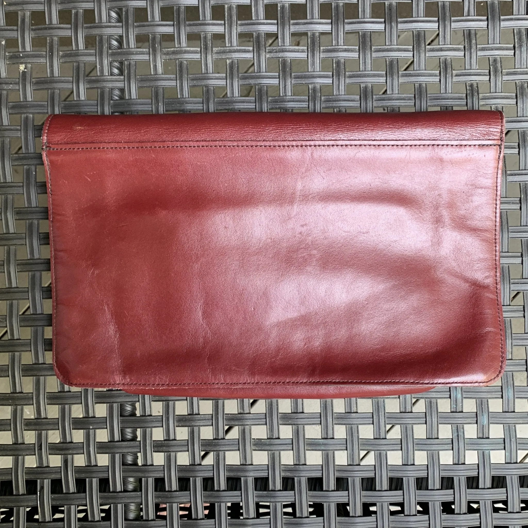 Vintage Burgundy Leather Clutch by John Romain. Envelope Style Handbag. Circa 1970.