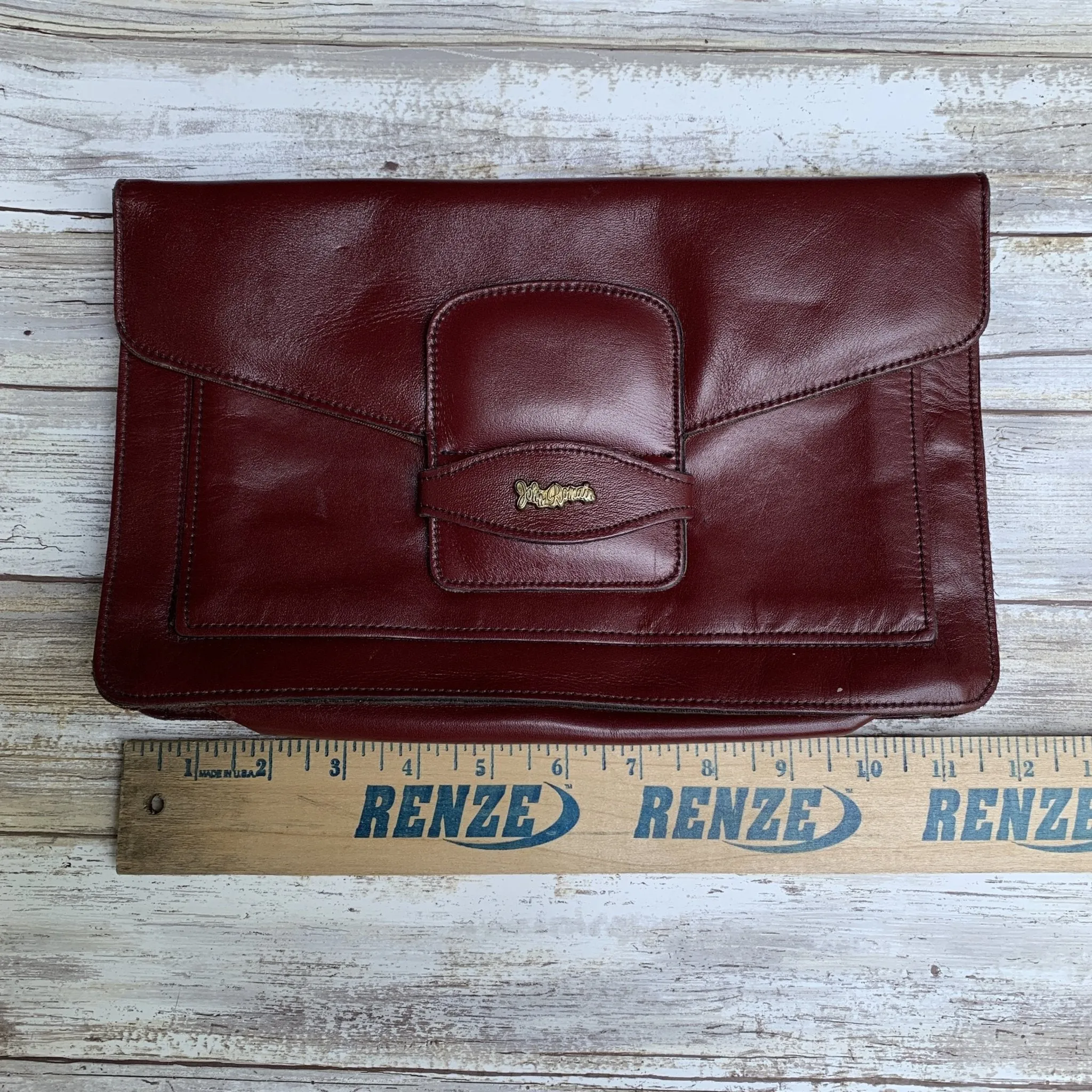 Vintage Burgundy Leather Clutch by John Romain. Envelope Style Handbag. Circa 1970.